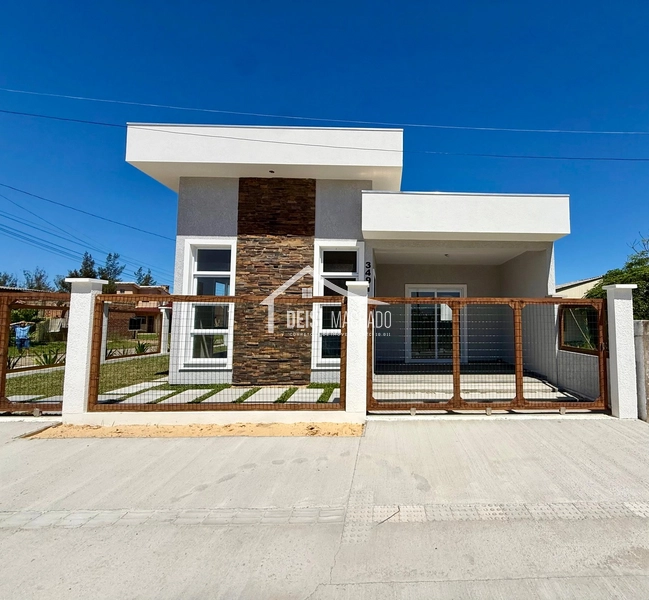 Casa moderna, funcional e cheia de luz natural.