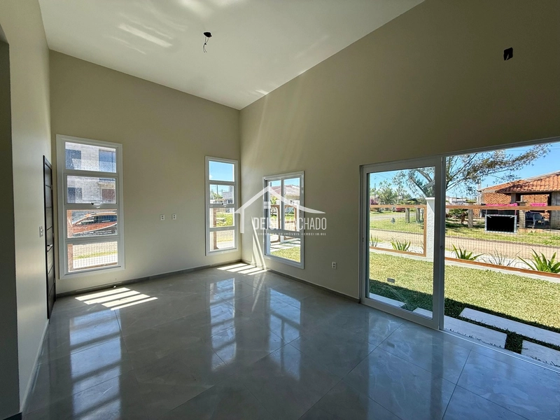 Casa moderna, funcional e cheia de luz natural.: 3ª foto da galeria de imagens do imóvel