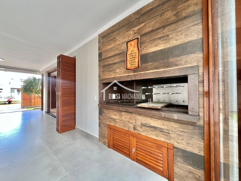 Sobrado amplo e completo em Capão Novo: 5ª foto da galeria de imagens do imóvel