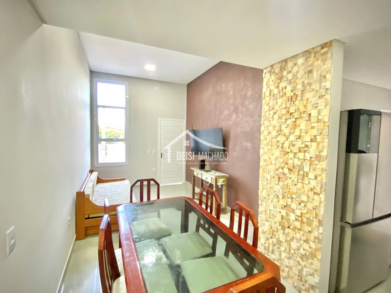 Linda casa geminada com piscina,  em capão Novo: 3ª foto da galeria de imagens do imóvel