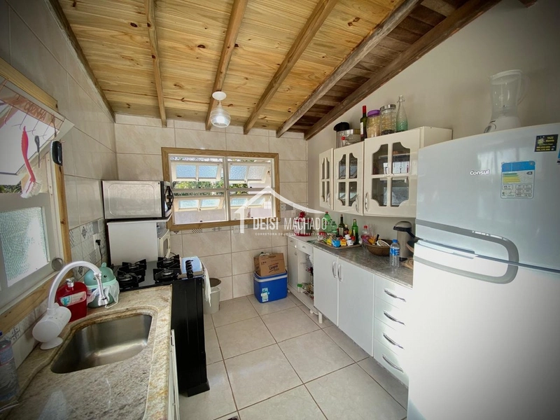 Casa mista de esquina em região de moradores no Posto 04.: 15ª foto da galeria de imagens do imóvel