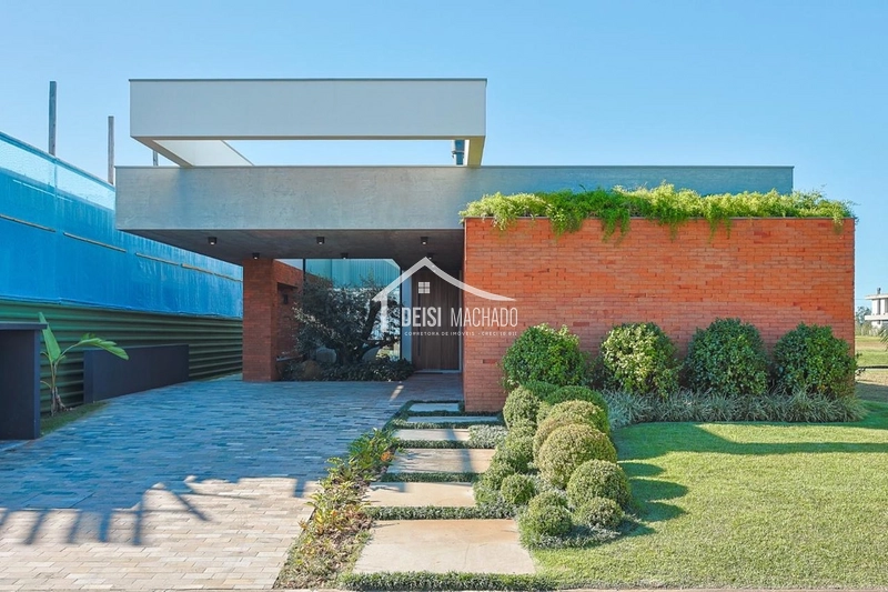 Casa beira lago à venda no Condomínio Reserva das Águas – Torres/RS: 1ª foto da galeria de imagens do imóvel