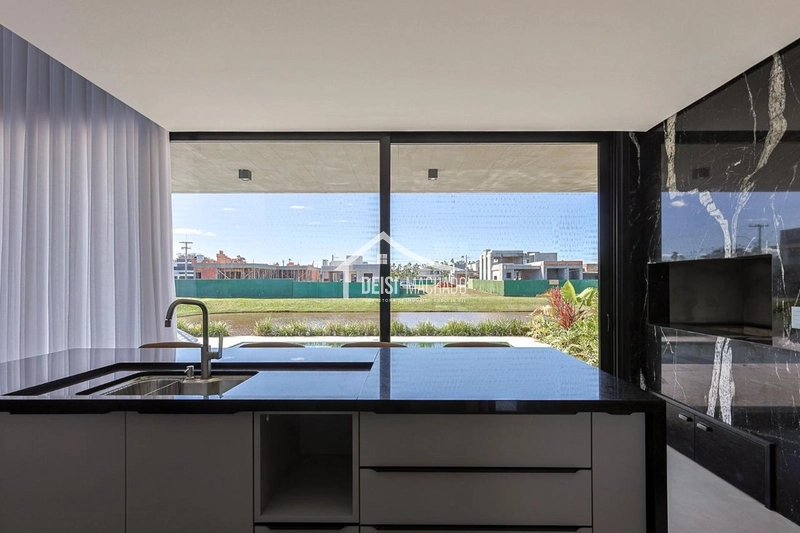 Casa beira lago à venda no Condomínio Reserva das Águas – Torres/RS: 16ª foto da galeria de imagens do imóvel