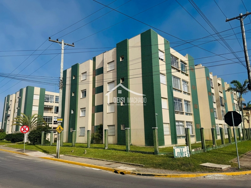 Apartamento térreo a venda em prédio com piscina em Capão Novo: 3ª foto da galeria de imagens do imóvel