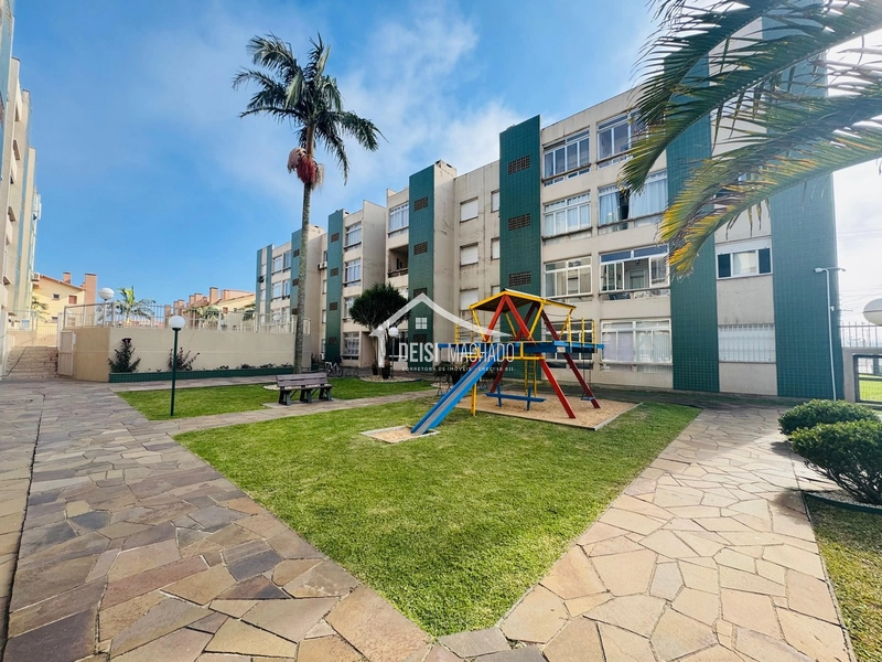 Apartamento térreo a venda em prédio com piscina em Capão Novo: 2ª foto da galeria de imagens do imóvel