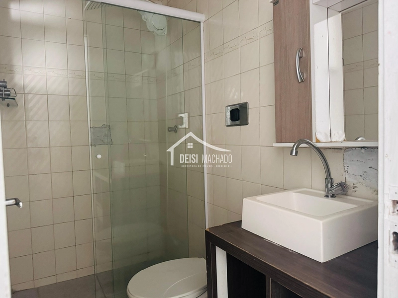 Apartamento térreo a venda em prédio com piscina em Capão Novo: 11ª foto da galeria de imagens do imóvel