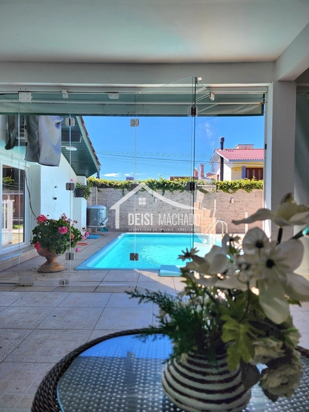 CASA 3 DORMITÓRIOS LOCALIZADA A POUCOS METROS DO MAR!: 66ª foto da galeria de imagens do imóvel