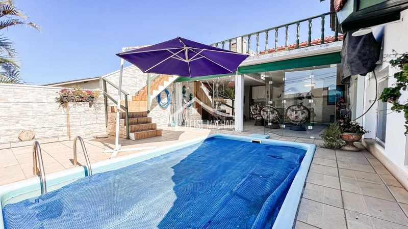 CASA 3 DORMITÓRIOS LOCALIZADA A POUCOS METROS DO MAR!: 57ª foto da galeria de imagens do imóvel