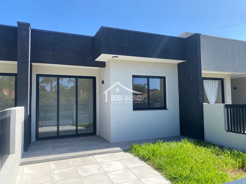 Linda casa geminada em Capão Novo