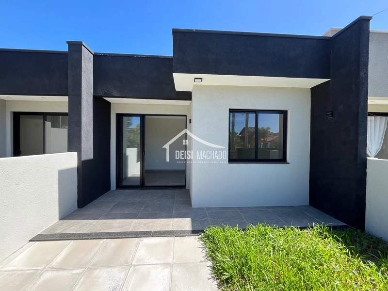 Linda casa geminada em Capão Novo: 3ª foto da galeria de imagens do imóvel