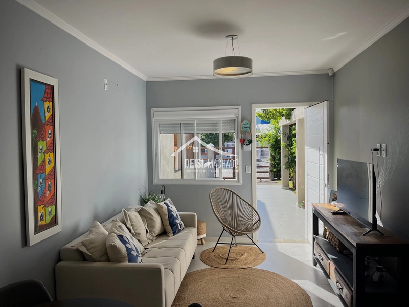 Linda casa geminada em Capão Novo: 2ª foto da galeria de imagens do imóvel