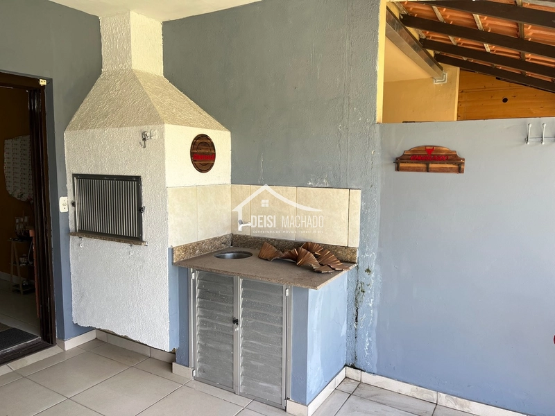 Lindo sobrado em excelente localização, em Capão Novo: 4ª foto da galeria de imagens do imóvel