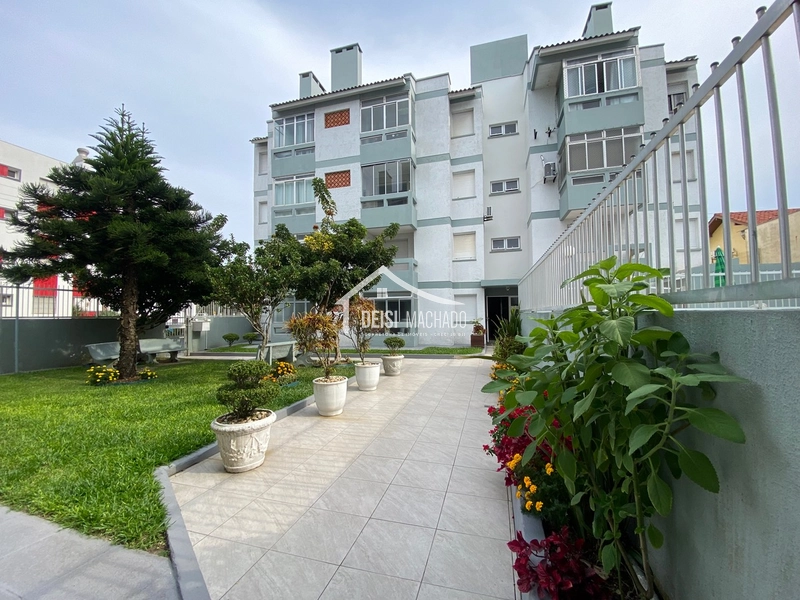 Apartamento térreo em prédio com piscina a venda na praia Capão Novo
