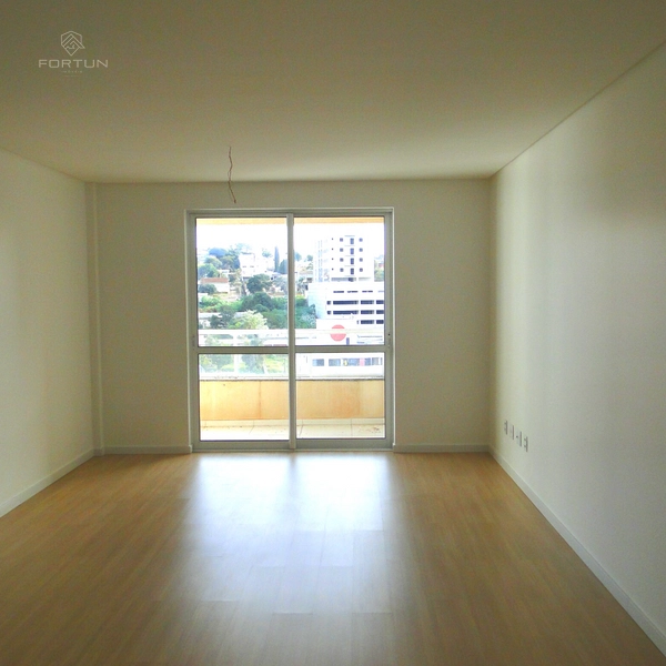 APARTAMENTO COM 1 SUÍTE E 2 QUARTOS NO CENTRO: 2ª foto da galeria de imagens do imóvel