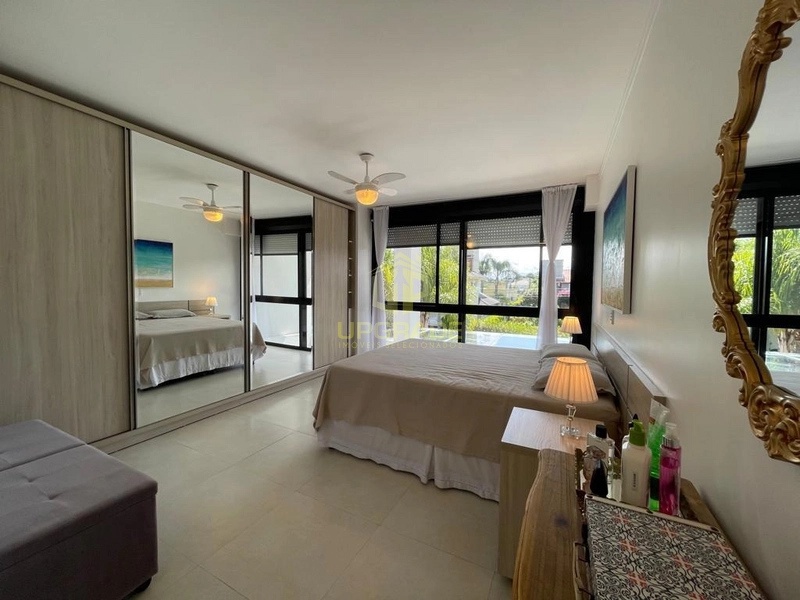 A vida melhora ao colocar o pé na areia!: 31ª foto da galeria de imagens do imóvel