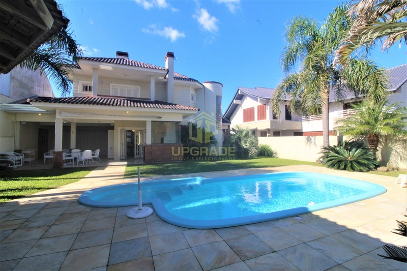 Um encanto de sobrado com piscina na região do Caburé em Atlântida.: 25ª foto da galeria de imagens do imóvel