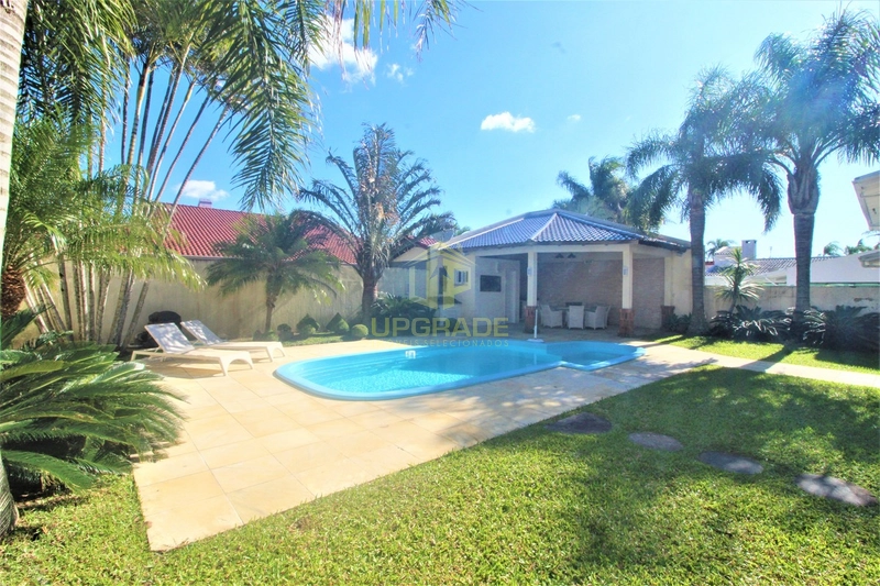 Um encanto de sobrado com piscina na região do Caburé em Atlântida.: 27ª foto da galeria de imagens do imóvel