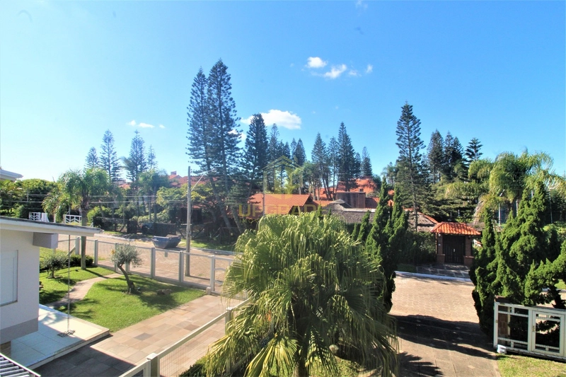 Um encanto de sobrado com piscina na região do Caburé em Atlântida.: 8ª foto da galeria de imagens do imóvel