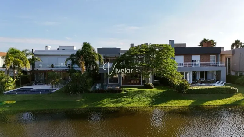 LINDO SOBRADO A BEIRA LAGO: 2ª foto da galeria de imagens do imóvel