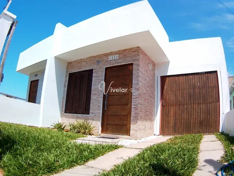 CASA A VENDA COM 3 SUÍTES COM LOCALIZAÇÃO PRIVILEGIADA: 1ª foto da galeria de imagens do imóvel