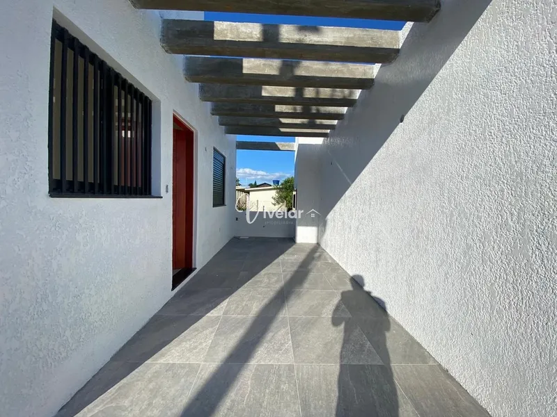 CASA DE ESQUINA A VENDA EM CAPÃO DA CANOA: 3ª foto da galeria de imagens do imóvel