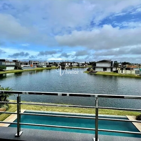 COM UMA VISTA PRIVILEGIADA, ESSA MANSÃO A BEIRA LAGO TE ESPERA !: 9ª foto da galeria de imagens do imóvel
