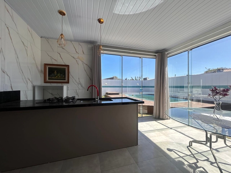 Casa a poucos metros do mar em Atlântida Sul!: 8ª foto da galeria de imagens do imóvel