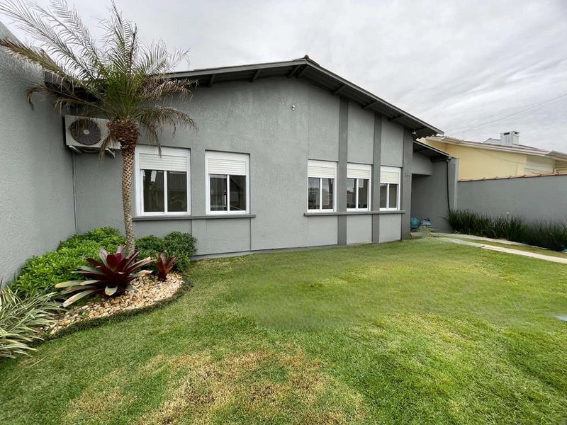 Casa em Atlântida Sul: 3ª foto da galeria de imagens do imóvel