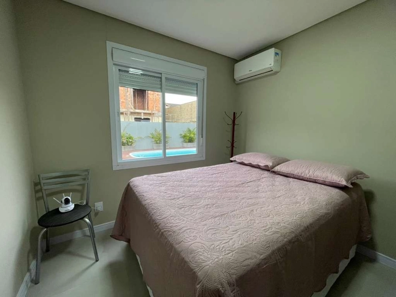 Casa em Atlântida Sul: 10ª foto da galeria de imagens do imóvel