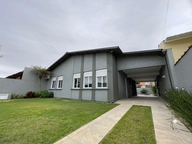 Casa em Atlântida Sul: 2ª foto da galeria de imagens do imóvel