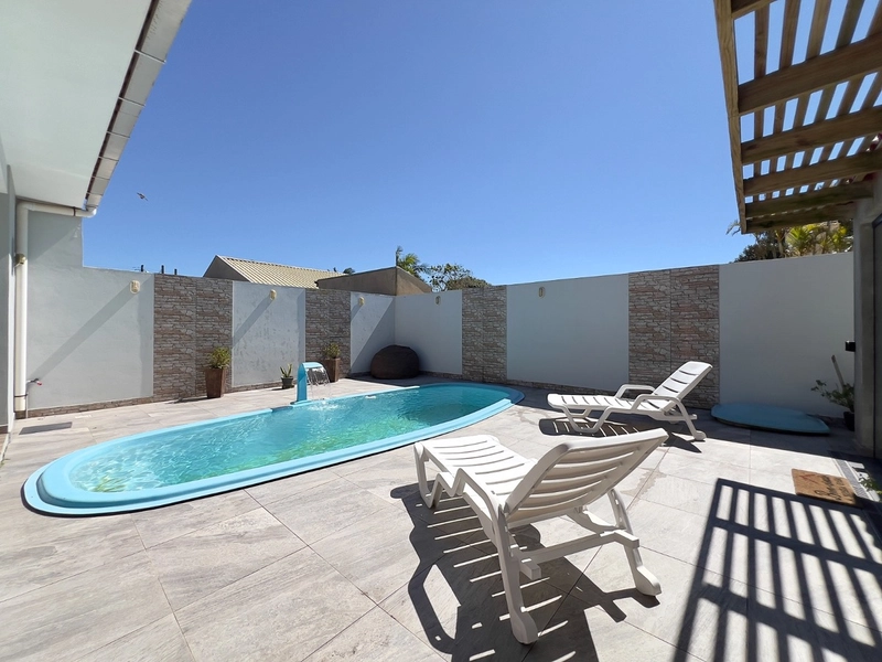 Sobrado em Atlântida Sul: 50ª foto da galeria de imagens do imóvel