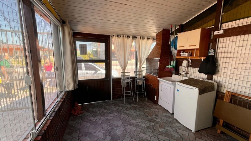 Casa em Atlântida Sul: 4ª foto da galeria de imagens do imóvel