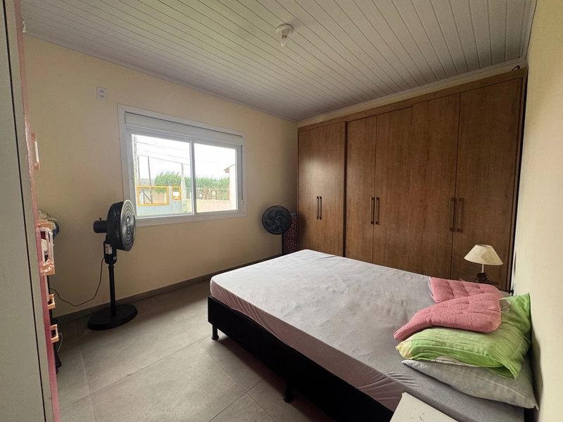 Casa em Atlântida Sul: 4ª foto da galeria de imagens do imóvel