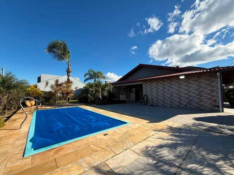 CASA COM PISCINA E 02 TERRENOS EM ATLÂNTIDA SUL: 3ª foto da galeria de imagens do imóvel