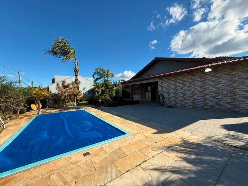 CASA COM PISCINA E 02 TERRENOS EM ATLÂNTIDA SUL: 2ª foto da galeria de imagens do imóvel