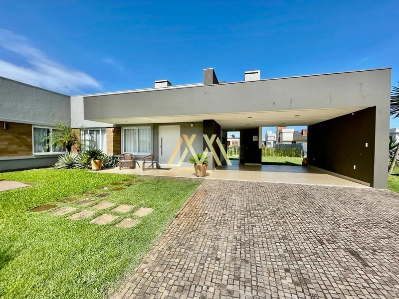 Casa à venda no condomínio Lagoa do Passo em Atlântida Sul!