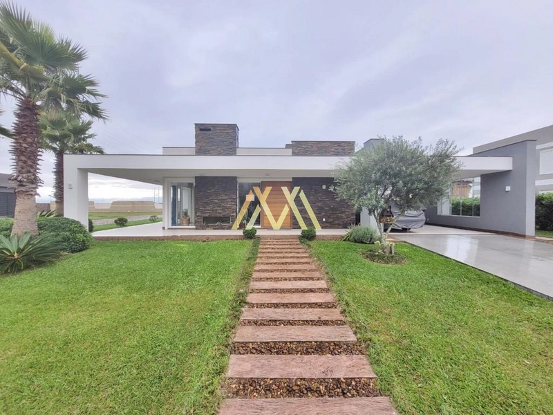 Casa à venda no condomínio Lagoa do Passo em Atlântida Sul!: 1ª foto da galeria de imagens do imóvel