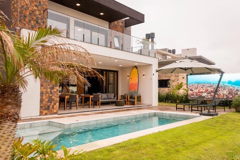 Sobrado à venda em condomínio em Capão da Canoa!: 2ª foto da galeria de imagens do imóvel