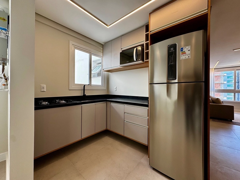Apartamento 2 Dormitórios com Suíte | A 1 Quadra do Mar | Zona Nova –: 4ª foto da galeria de imagens do imóvel