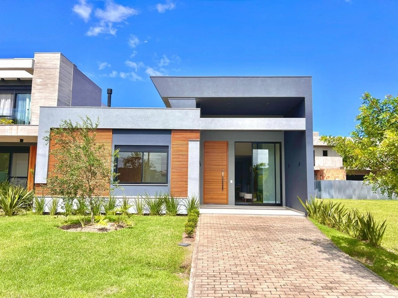 UMA DAS MAIS BELAS CASAS DO CONDOMÍNIO MAIS COBIÇADO DE XANGRI-LÁ: 1ª foto da galeria de imagens do imóvel