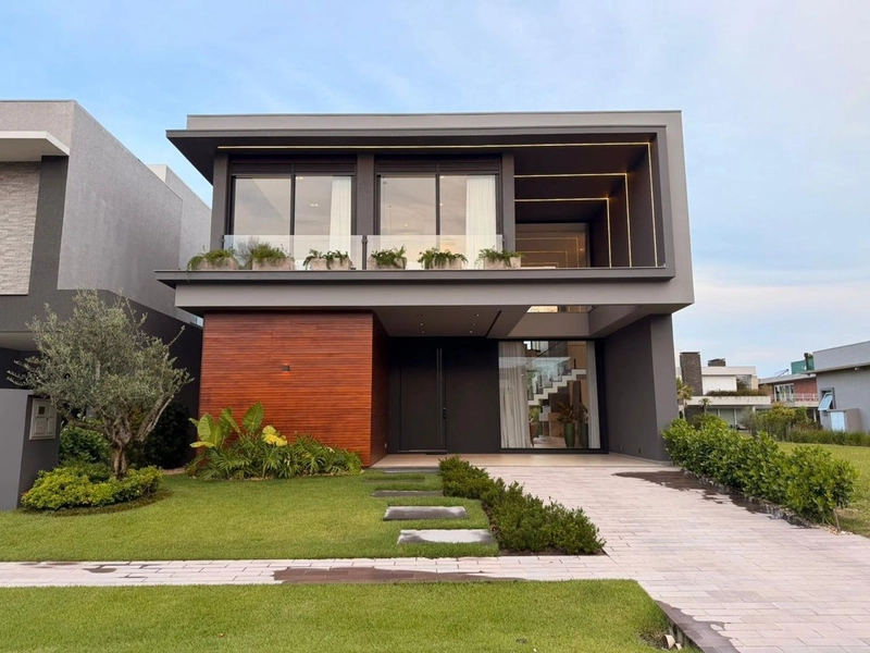 CASA 2 PISOS - com 5 suites,sendo uma terrea,: 1ª foto da galeria de imagens do imóvel