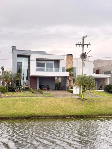 sobrado excepcional av.central frente lago: 1ª foto da galeria de imagens do imóvel