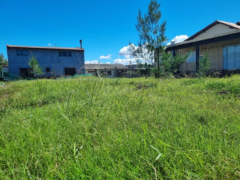 terreno 12x25, aterrado e todo cercado, beira mar,  escriturado: 2ª foto da galeria de imagens do imóvel
