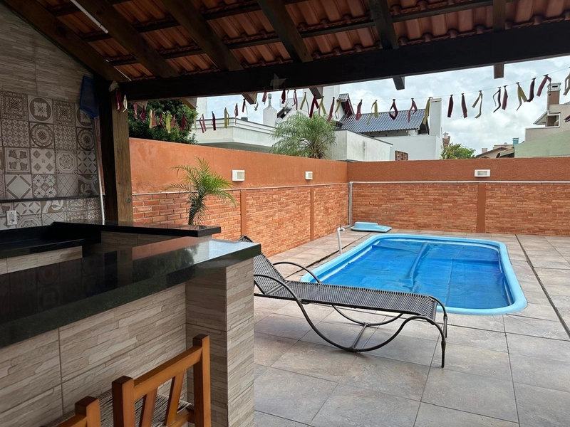 Ótima casa de 3 dormitórios com piscina: 3ª foto da galeria de imagens do imóvel