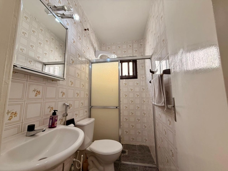 Casa 3 dormitórios próxima ao mar e ao comércio: 25ª foto da galeria de imagens do imóvel