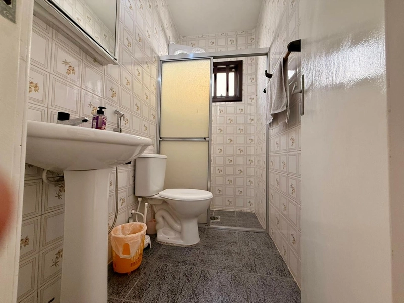 Casa 3 dormitórios próxima ao mar e ao comércio: 31ª foto da galeria de imagens do imóvel