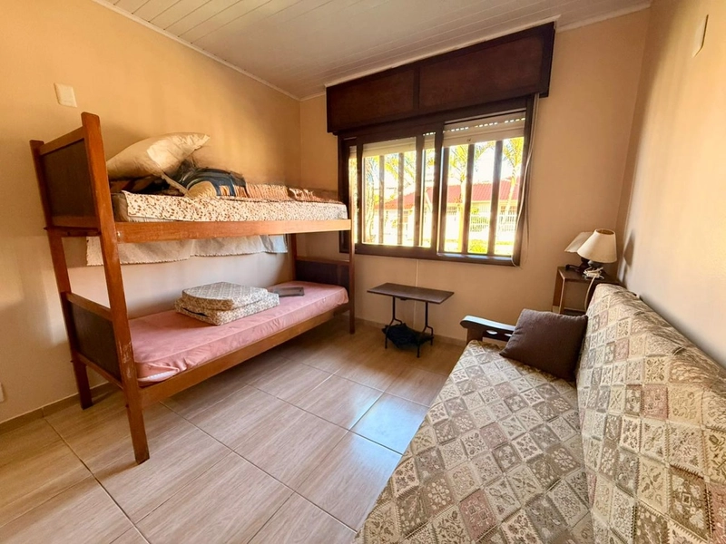 Casa 3 dormitórios próxima ao mar e ao comércio: 27ª foto da galeria de imagens do imóvel