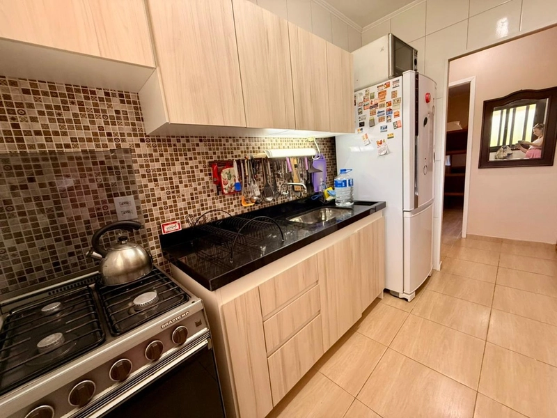 Casa 3 dormitórios próxima ao mar e ao comércio: 24ª foto da galeria de imagens do imóvel