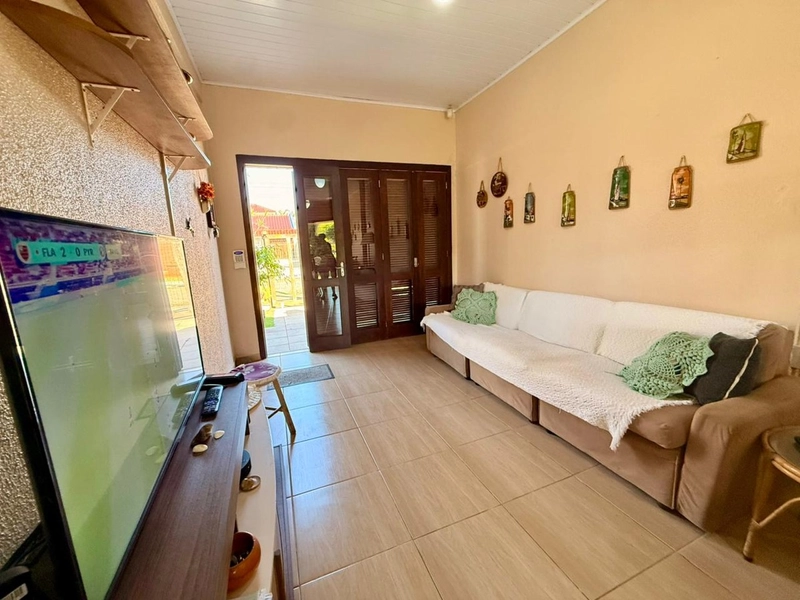 Casa 3 dormitórios próxima ao mar e ao comércio: 12ª foto da galeria de imagens do imóvel