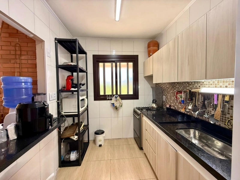 Casa 3 dormitórios próxima ao mar e ao comércio: 23ª foto da galeria de imagens do imóvel